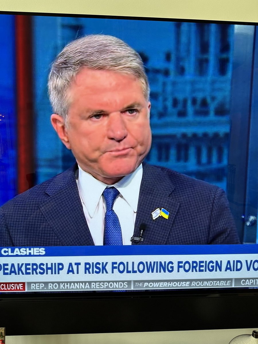 This is a Republican U.S. Congressman who chairs the House Foreign Affairs Committee & is wearing flag pins of multiple different countries on national television. Interestingly, the United States of America isn’t one of them.