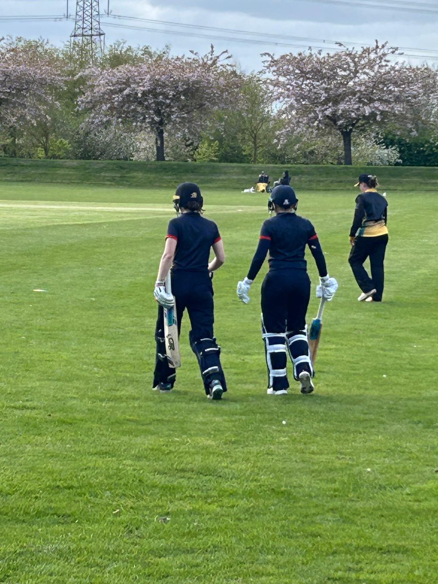 Skipper May Drinkell and Emily Dack walk out to open the batting for Norfolk Women here at Spalding CC v Lincs, chasing 178 from 50 overs. @FinanceShopLtd