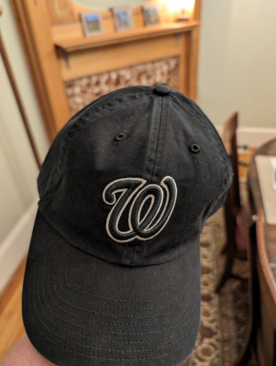 Washington20009's tweet photo. My low stakes conspiracy theory: 

The Washington Nationals have begun selling black curly W ballcaps because fans were not buying/wearing red ballcaps around DC out of fear of being mistaken for MAGA https://t.co/o44tCSmKJ2