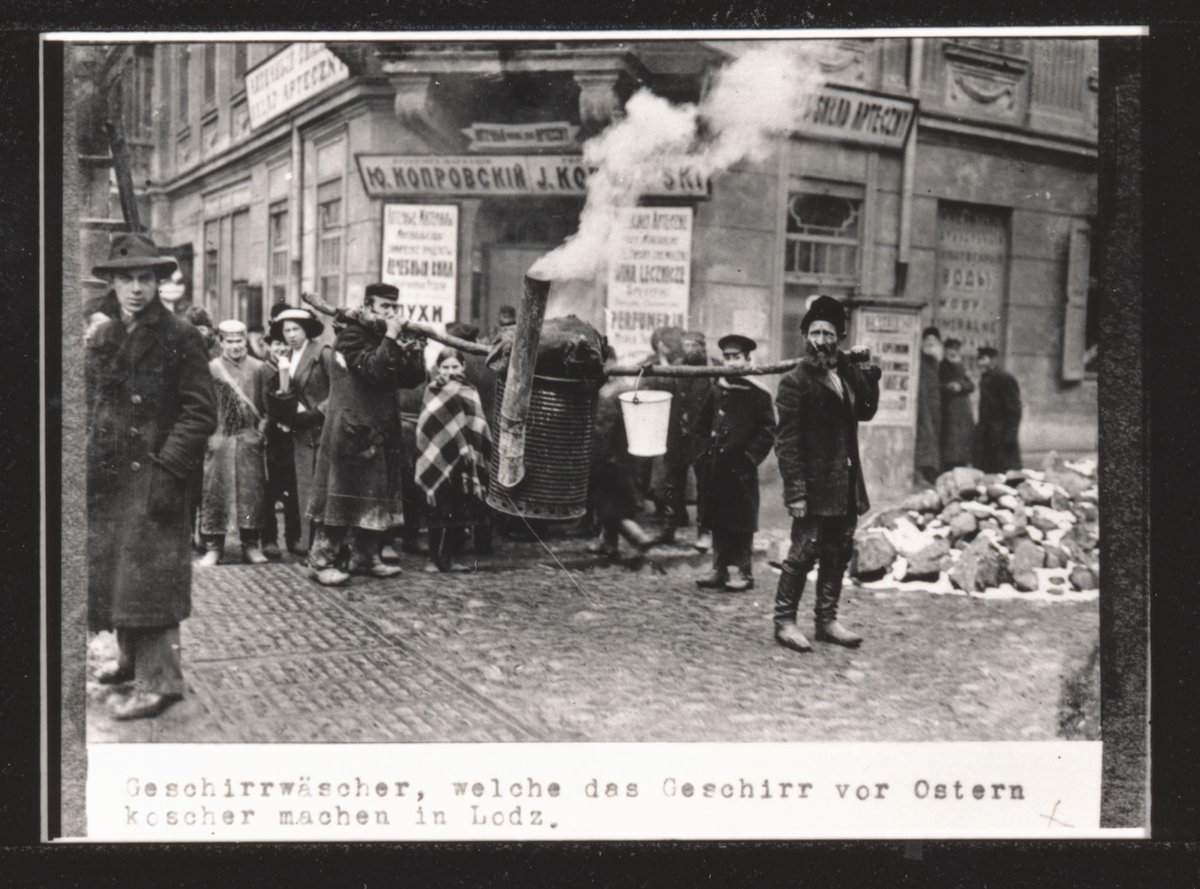 Are you ready for the seder tomorrow night? Dish washers who wash dishes to make them kosher for Passover. Outside J. Koprovsky's pharmacy in the Lodz, ca. WWI. #fromtheyivoarchives #jewishholiday #passover #pesach #peysekh