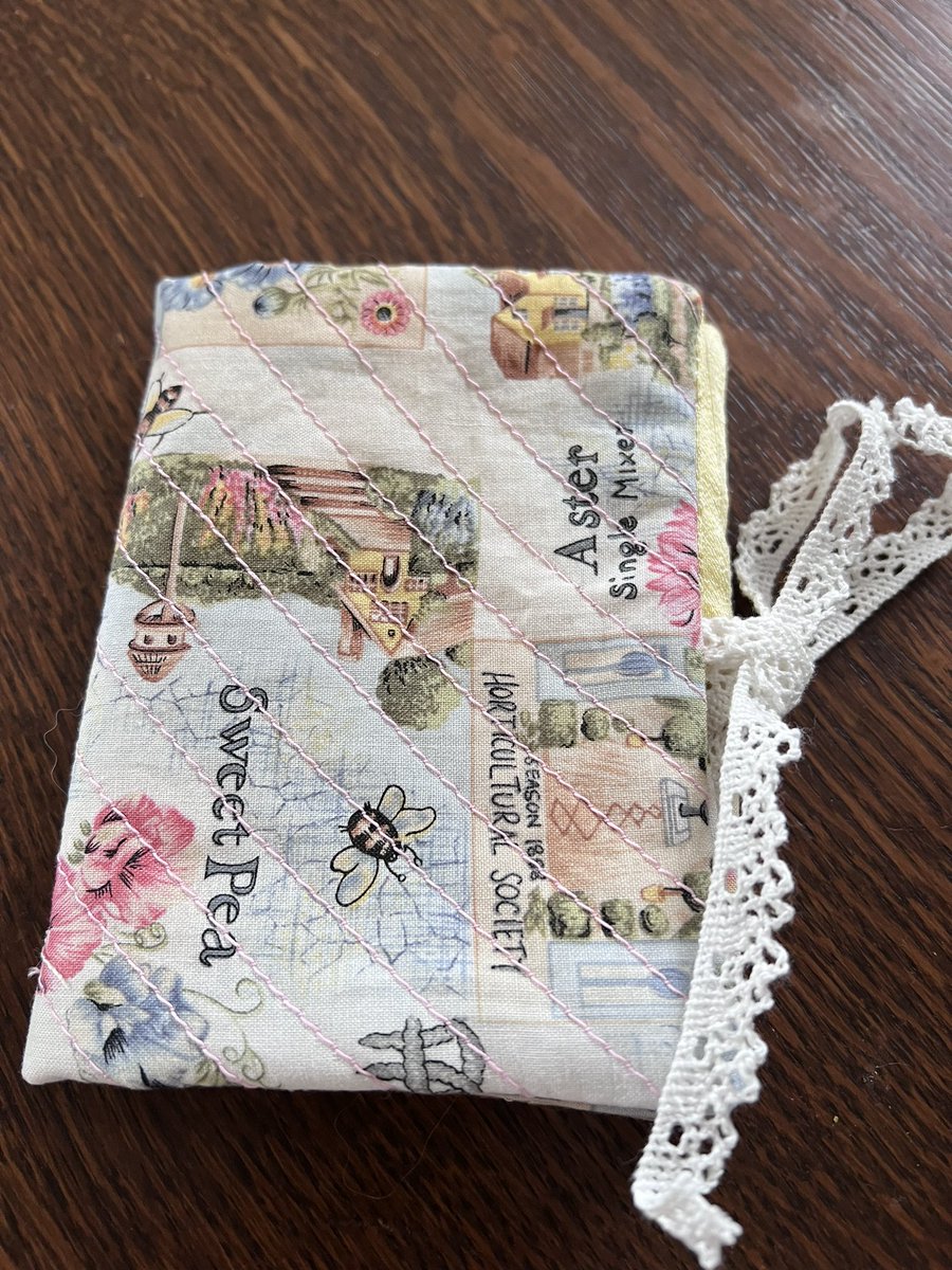 In an effort to use up left over quilt batting, I’ve been making some fabric needle books for presents.