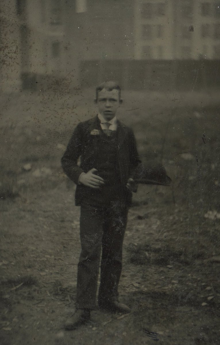 michael_agovino's tweet photo. One of my favorite #tintypes from New York City … the young man with the bowler hat in an empty late. The tenements are visible in the background. Tintypes are one and done; no negatives. This place must have been significant for this fellow. 📸 #nyc #history #photograph https://t.co/LRVQu95Sqk