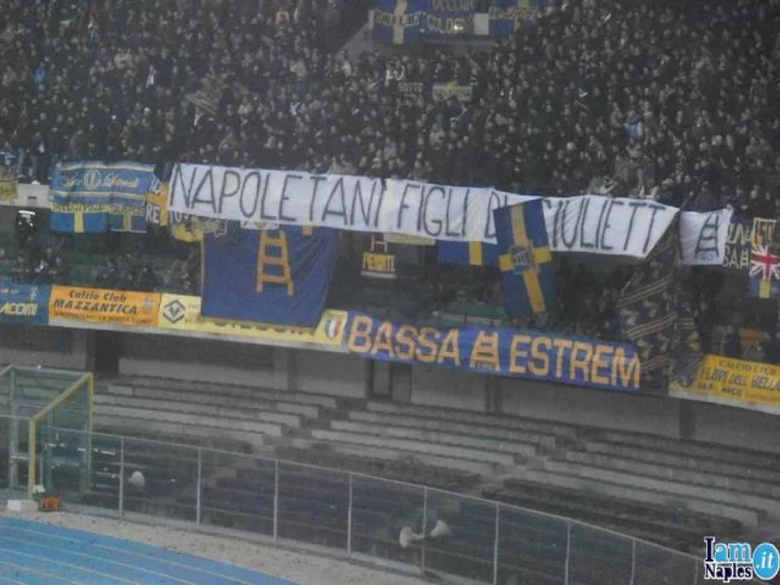 Verona fans ‘welcomed’ Napoli fans (whom they do not consider Italian) with a 'Welcome to Italy' banner.

Neapolitans replied with a 'Juliet is a whore” banner (Romeo & Juliet takes place in Verona.)

Years later, Verona fans with a banner:

'Neapolitans, children of Juliet'