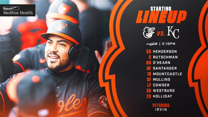 Orioles at Royals | O’s Starting Lineup | MASN2 | 2:10 p.m.  SS - Henderson C - Rutschman DH - O’Hearn RF - Santander 1B - Mountcastle CF - Mullins LF - Cowser 3B - Westburg 2B - Holliday P - Irvin  The graphic features an image of Santander smiling as he walks through the dugout.