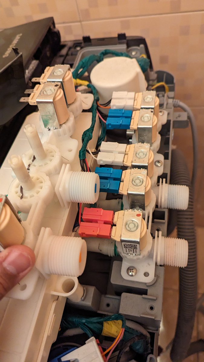That washing machine valve bank comes as a full spare kit, but it's just one solenoid that needs replacement at a time. Saved it from last time and had to do a swap a second solenoid today. Feels good not having to run around service shops.

#HomeRepair
