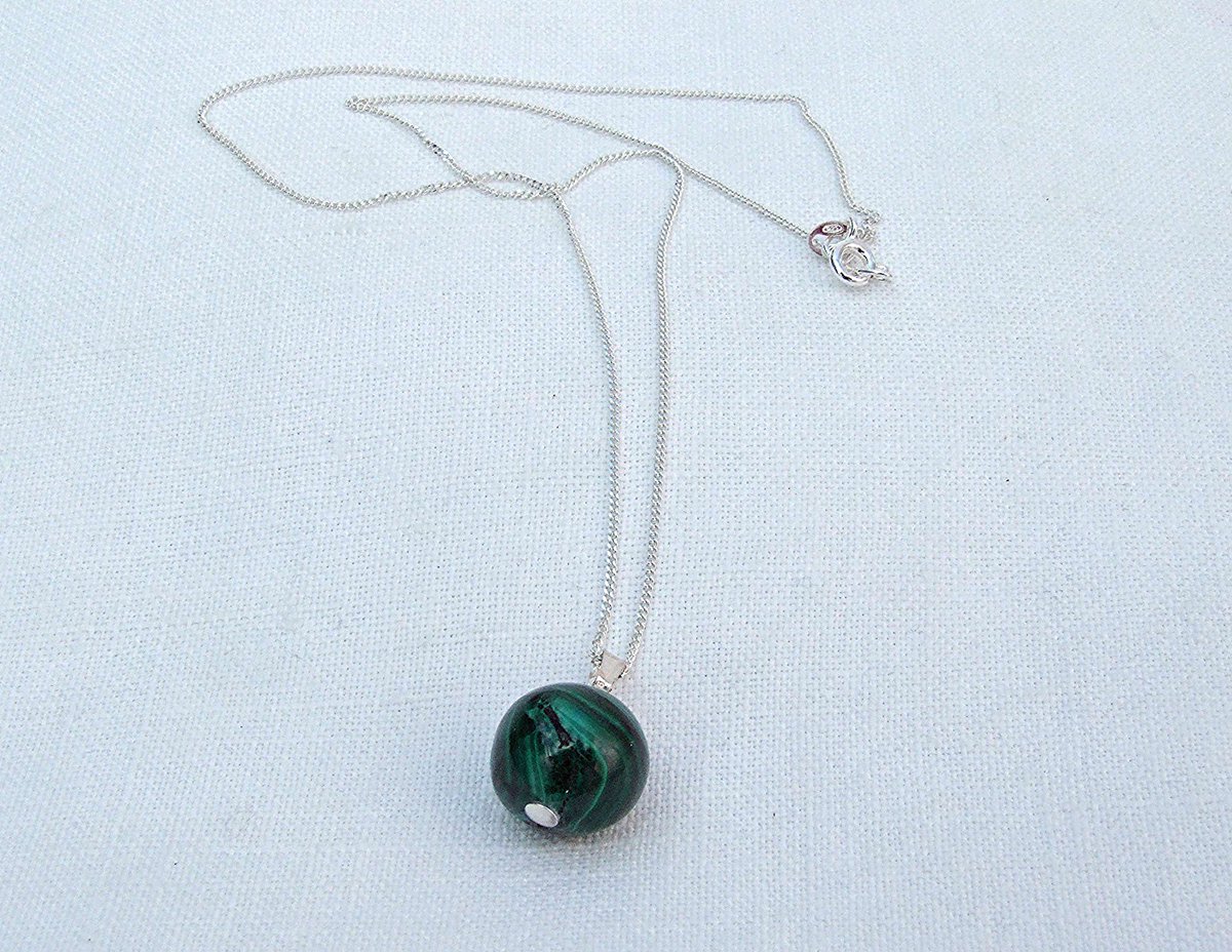 And made specially to order, a Victorian malachite ball pendant