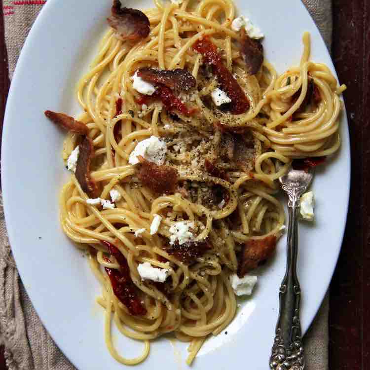 Sun dried tomato and goat cheese carbonara is a tasty variation on the classic preparation ow.ly/KbHv50R9USj @foodandwine #cooking #recipes