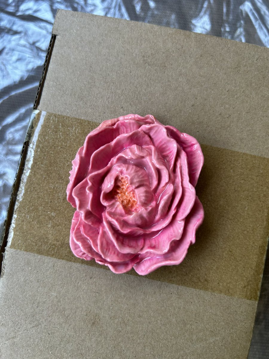 i hand sculpted a peony flower and made it into a choker