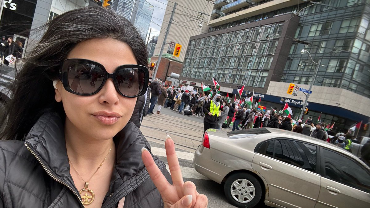 That feeling when you run into a pro-Hamas rally while walking your dog in downtown Toronto… I didn’t have my lion and sun flag but I always wear my Farvahar necklace. Am Yisrael Chai. #IRGCterrorists‌‌ #JavidShah