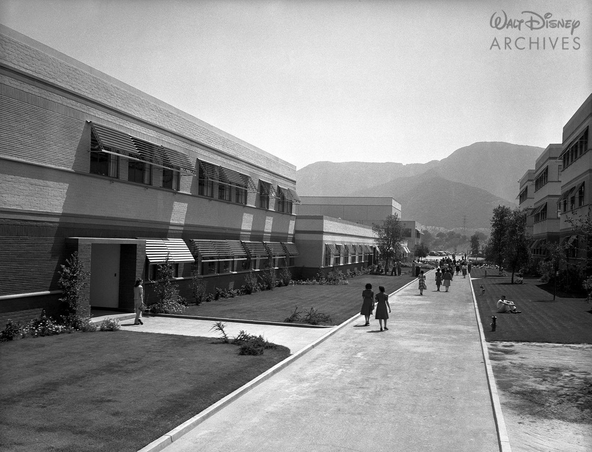 A very early photograph of the newly competed Walt Disney Studios in Burbank, California. I always find this photograph fascinating due to how pristine all of the new construction is along with how small all of the foliage is compared today.