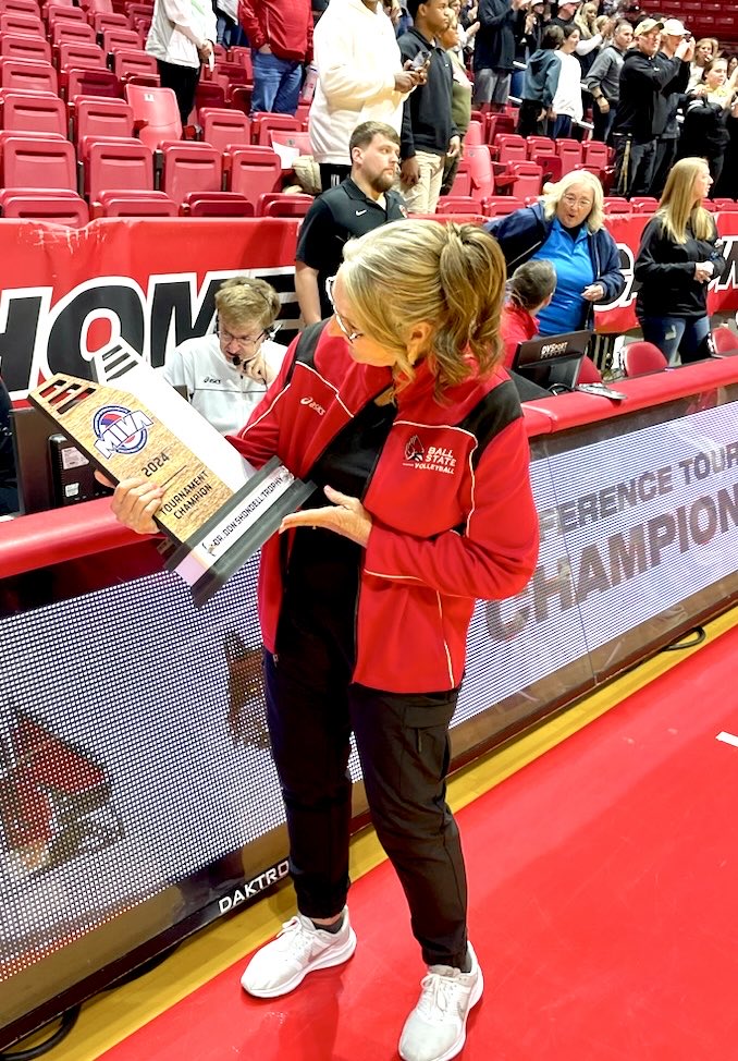 My dear sister, Kim, prepares to present the Don Shondell MIVA Tournament Championship trophy to champion - Ohio State - last night at Ball State. The MIVA recently honored our father by naming the event that determines the Midwest representative to the NCAA tourney after him.