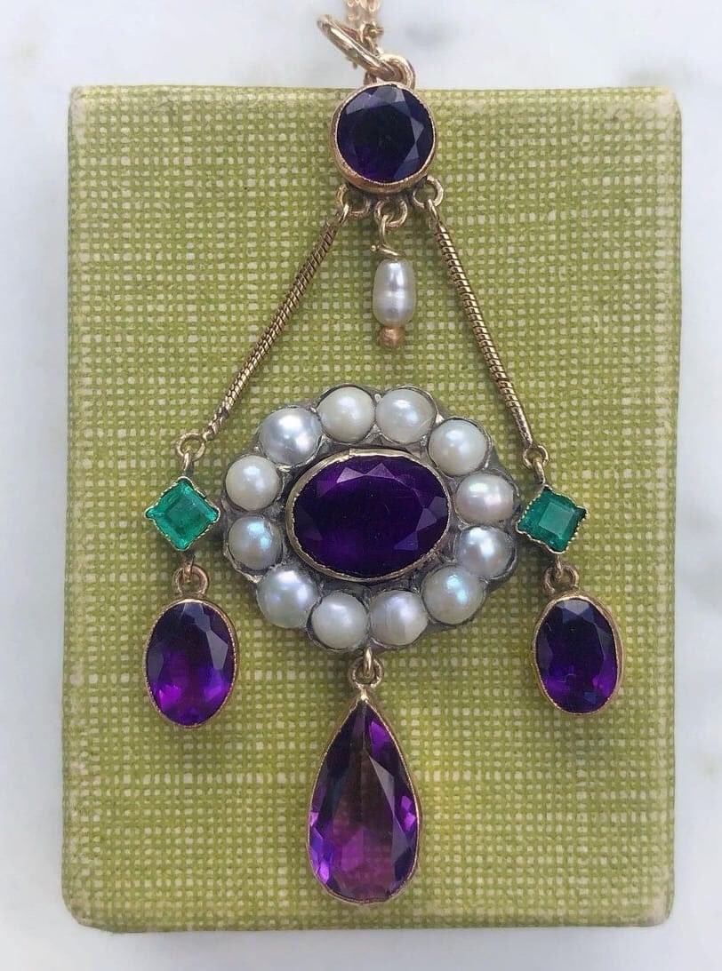 Victorian suffragette pendant in 15K gold with amethyst, pearls, and emeralds. Green, purple, and white were worn in jewelry to show support for women’s right to vote in England and the US.