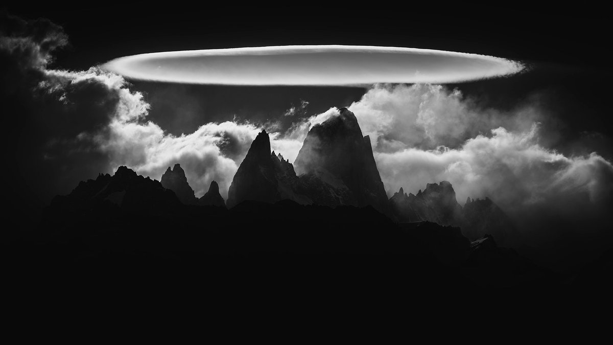 A ufo-shaped lenticular cloud settles over El Chaltén, Argentina. Francisco Negroni, 2014.