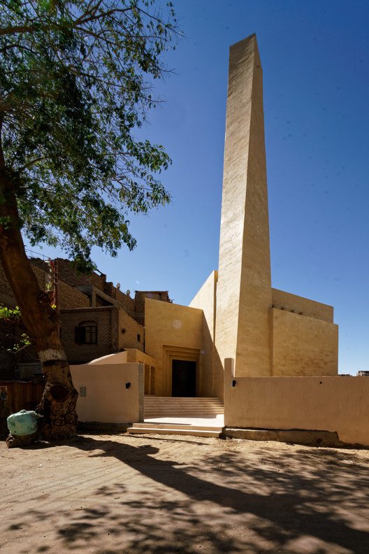 Basuna Mosque, Sohag, Egypt
The entry is on the side to separate the mosque from the street and lessen outside noises
The dome of the mosque ,acting as as a skylight and as a breeze-catcher, is one of a kind 
The minaret was done anti clock wise inspired by Hajj and the letter أ