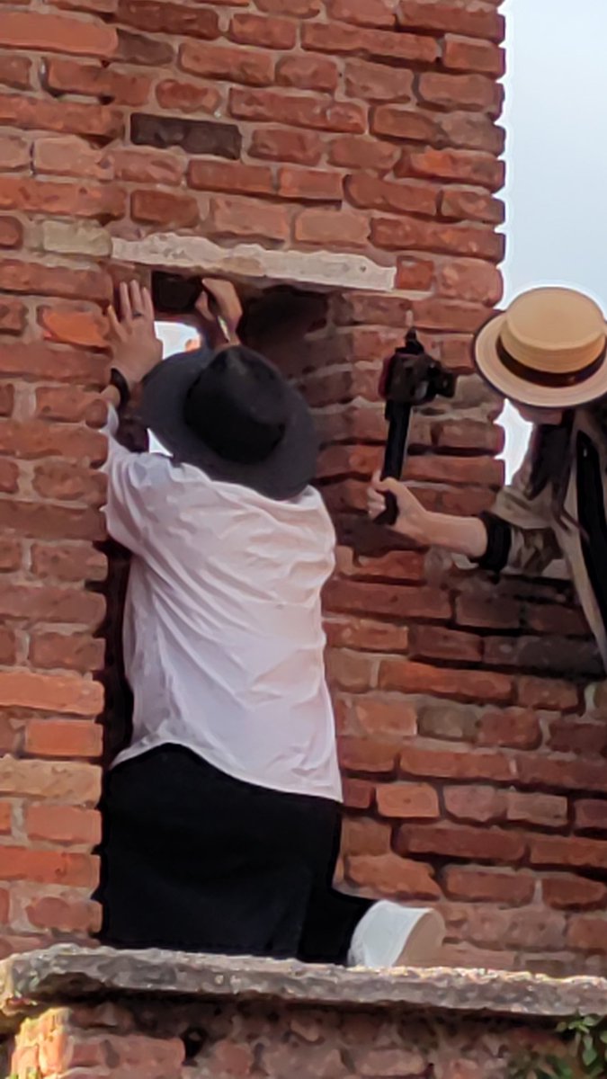 jetsetsam's tweet image. Awful tourists videotaping themselves defacing the castle bridge in #Verona Italy #Castelvecchio @castelvecchiovr #Tourists #arrestthem