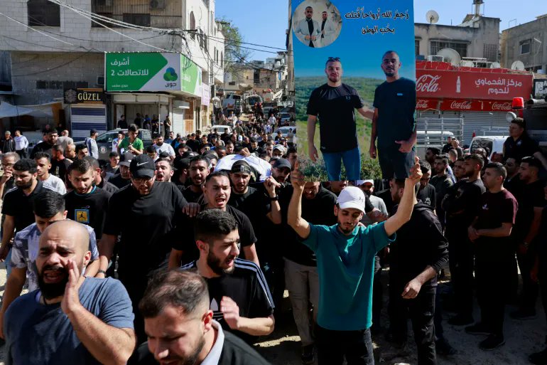 West Bank | Earlier Today: A funeral was held for 14 Palestinians killed in the series of violent Israeli raids on Nour Shams refugee camp in Tulkarem