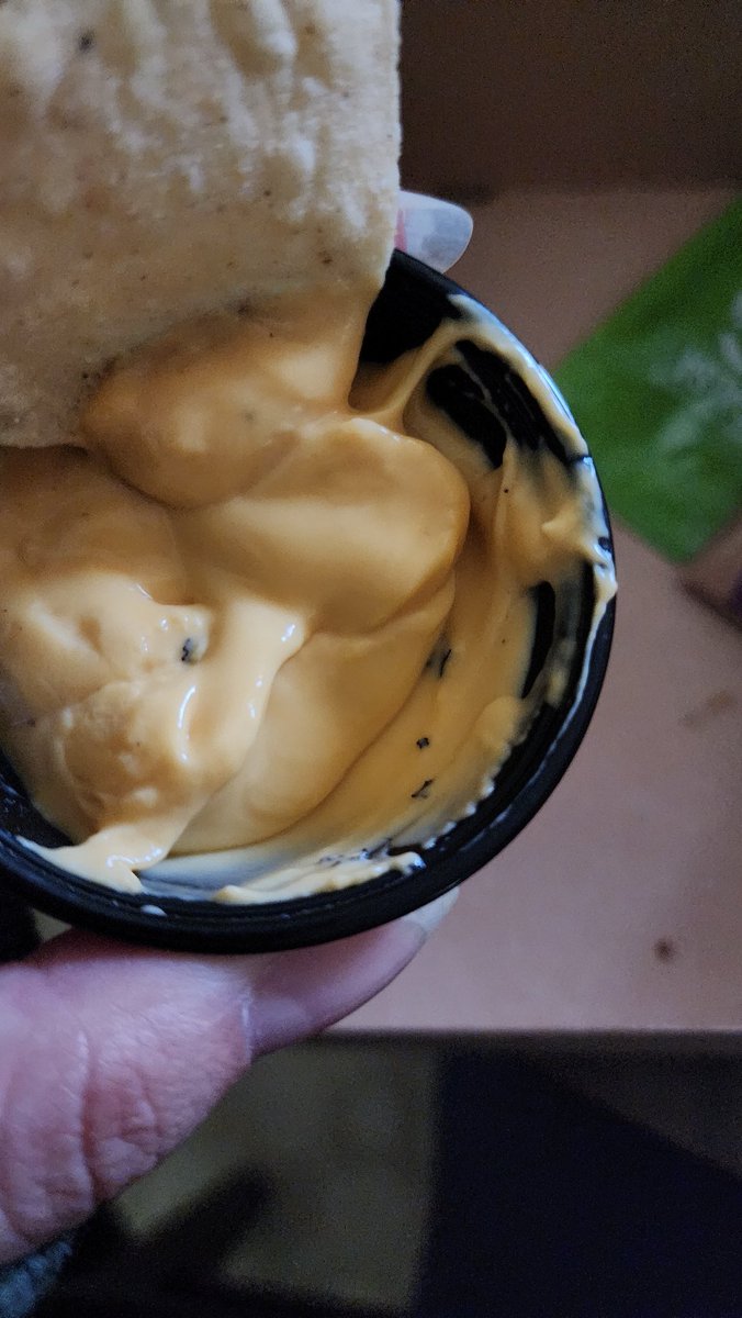 promisedsin's tweet image. I love @tacobell, but wtf is in my nacho cheese sauce. I'm not eating this 🤢