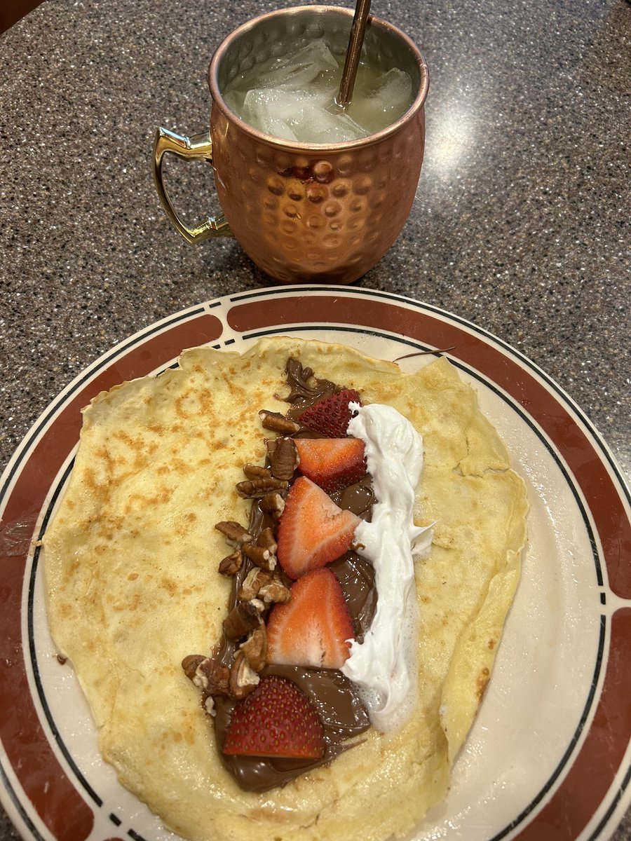 First time making crepes and they are yummy (recipe courtesy of @thepioneerwoman! Drink is the London morning (courtesy of a bartender in Arizona). 1 oz gin 2 oz orange juice 1/2 lime Small can ginger beer Enjoy your Sunday!