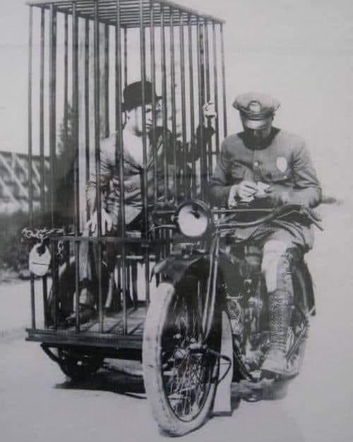 Philadelphia 1921. Harley Davidson motorcycle with jail cell sidecar.