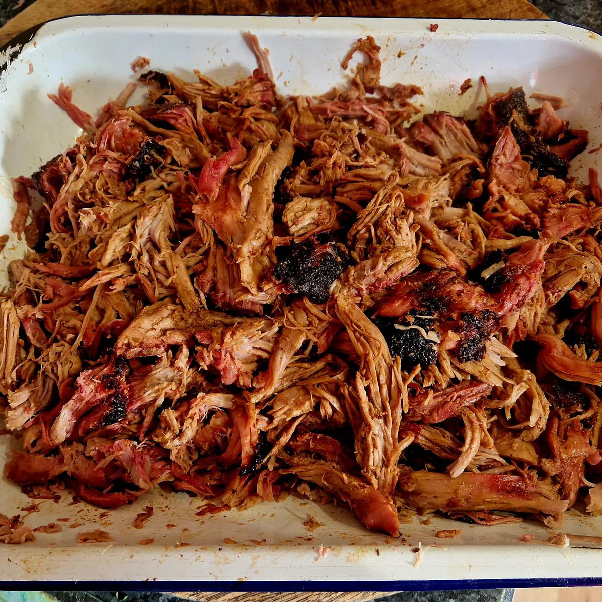 Epic Pulled Pork 🔥Created by Robbie @bbqandsmoke365 using our Fossil Farm pork shoulder. Tender and juicy 😋Perfect as a pulled pork sandwich, with a side salad or with mozzarella and caramelised onion over homemade chips 👨‍🍳🤌