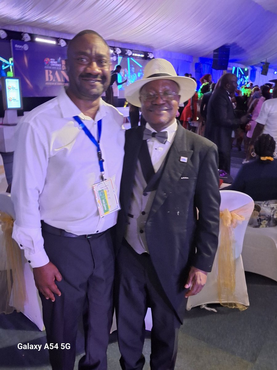 With a good friend, a wonderful Rotarian and a generous supporter of the Rotary Foundation Archklap Society Member Kenneth Kiiza during the Governors Banquet.