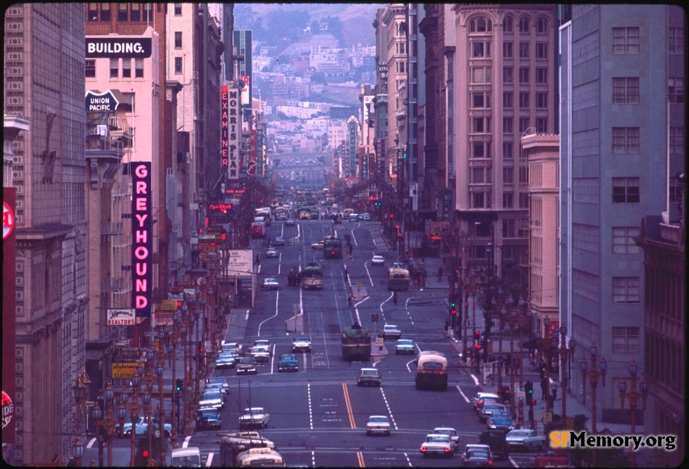 Market Street, May 1964 A telephoto and foreshortened view up Market from the Embarcadero Freeway or maybe the Ferry Building Tower. My uncle had a telephoto lens to get this Pre-Bart construction shot #sfhistory #neon #sanfrancisco