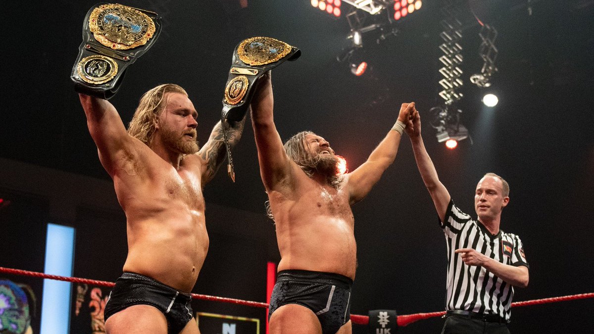 April 21, 2022:

At the BT Sport Studios, Mustache Mountain (#TylerBate & @trentseven) def. @OroMensah_wwe & @ashtonsmith_uk in a 2-out-of-3 Falls match to retain the #NXTUK Tag Team Championships via controversial fashion as Seven used the ropes to secure final pin. 

📸 WWE