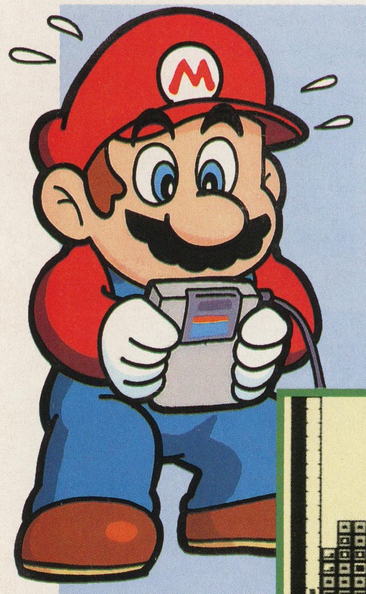 Mario playing on his GameBoy.
