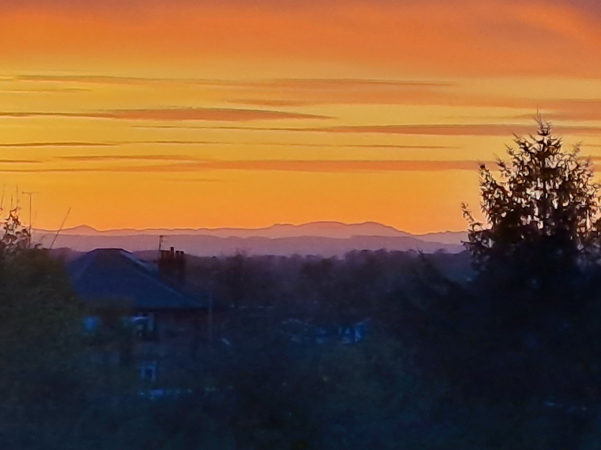 Hills of Arran in south Glasgow sunset