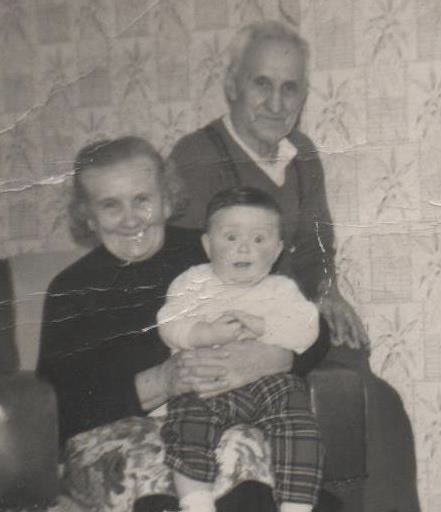 With Granny & Granda Gracie: Mary & Jimmy. Baillieston, 1964.