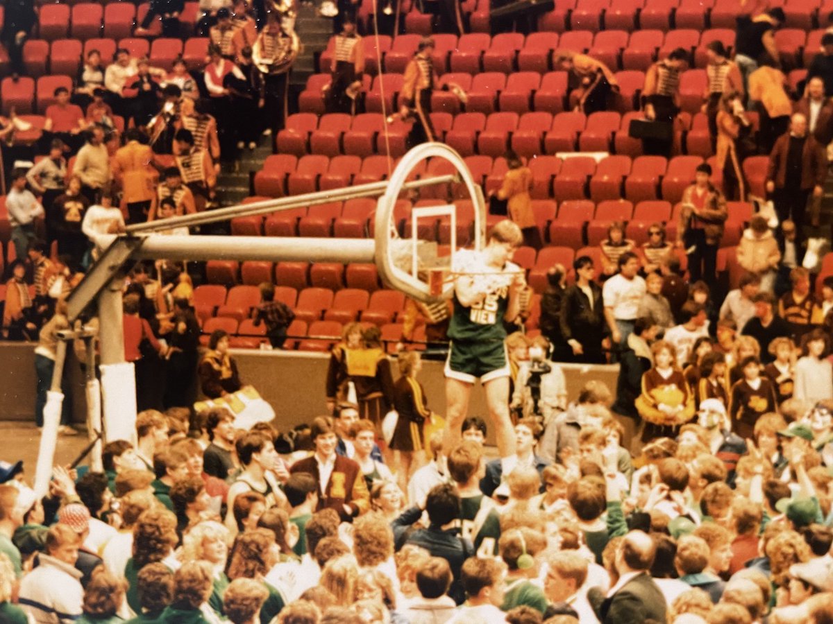 MUSTANG MOMENT- March 11, 1986. Junior guard Andy Schultz goes through the rim to cut down the net as the Mustangs defeat Forest Lake, 60-52, at the Mpls Auditorium to win the Section 4AA championship. #TeamFirst #MakeEmBelieve