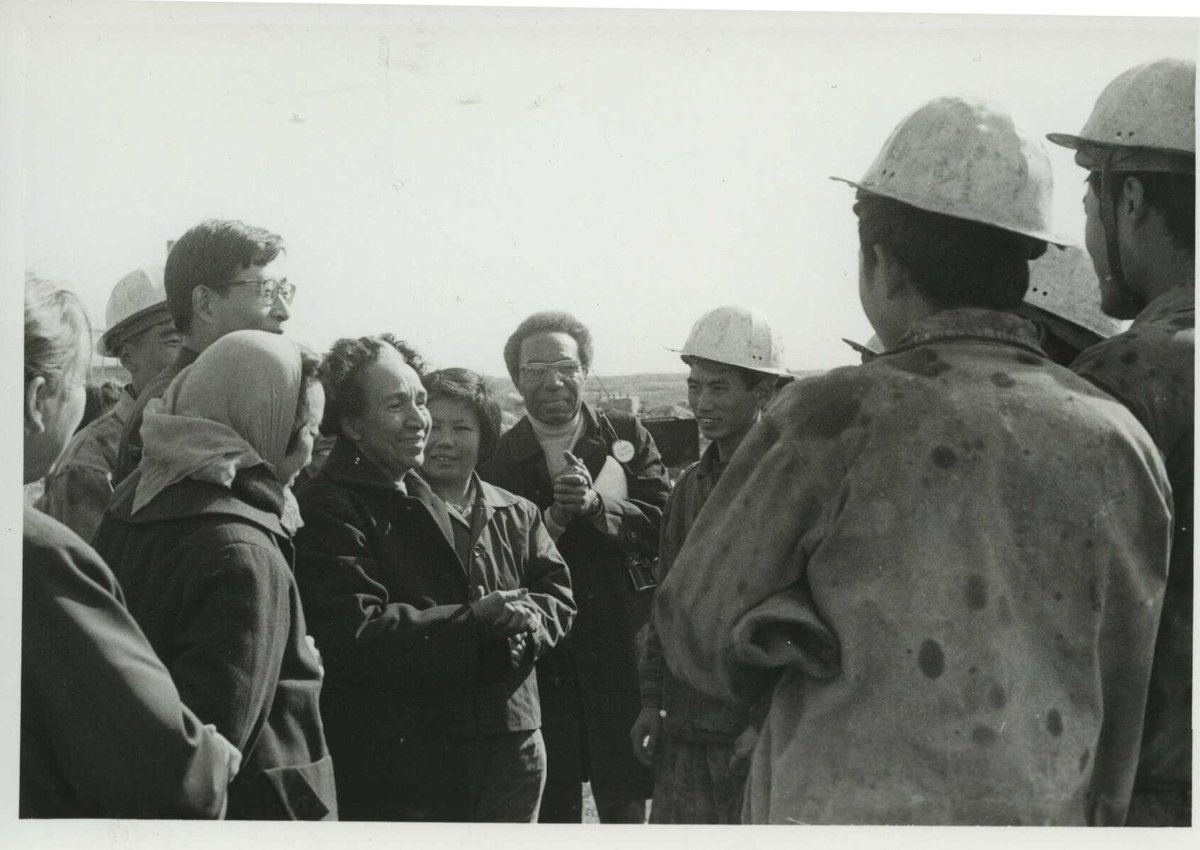 Shirley Graham Du Bois & her son David talking with oil workers in China (1972)