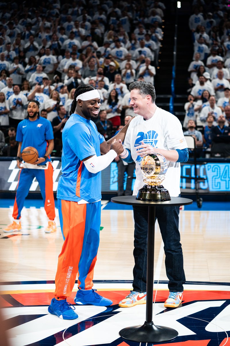 okcthunder's tweet photo. Northwest Division Champions ⚡️

We thank @davidfholt for presenting @luthebeast and the Thunder with the trophy!

And now in @PaycomCenter, the banner is raised 👏 https://t.co/lVBg38i8UQ