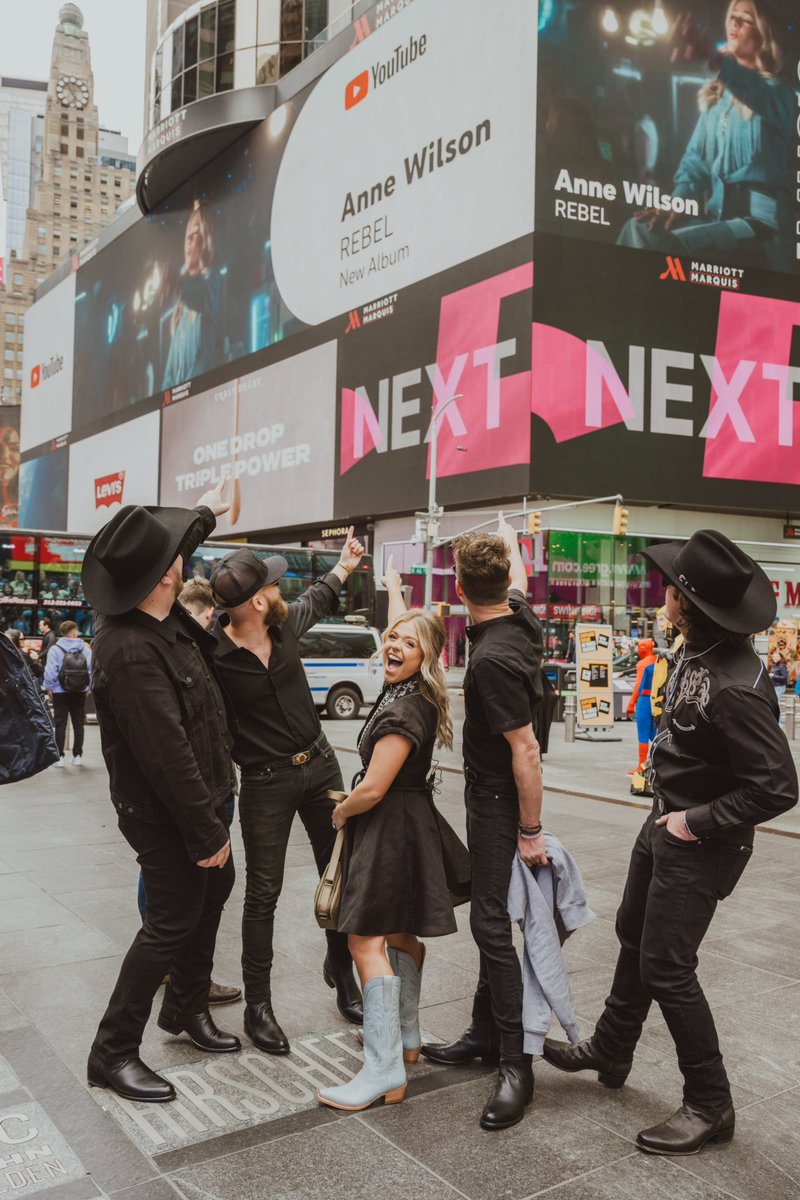 How it feels to be in Times Square with your band AND on a billboard. Thank you @youtubemusic for the support. You can listen to REBEL now on #YouTubeMusic  🫶✨🤠🎶⭐️ 📸: Laney Oakes Photography