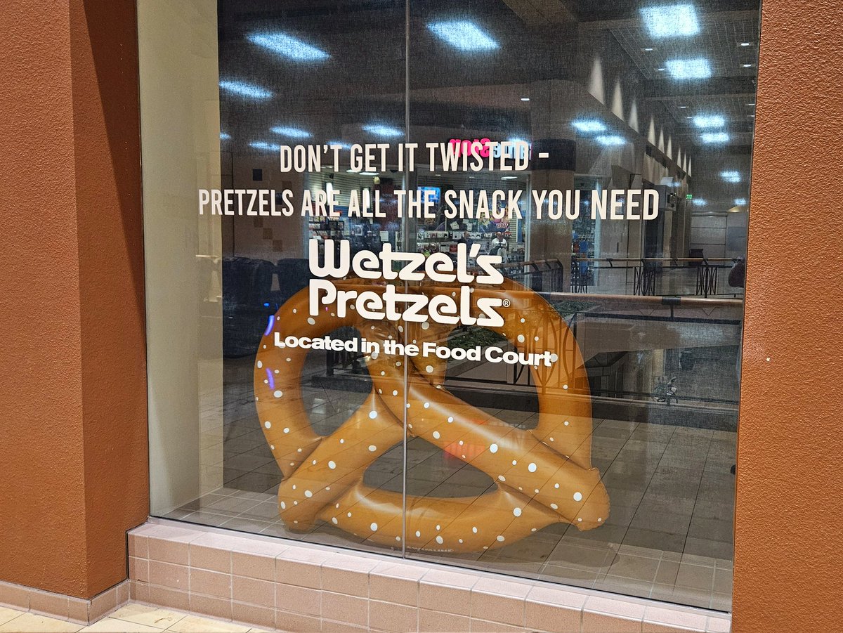 They're using novelty pool rafts in the dead half of my local mall to advertise the food court. It's creative, but it's still giving dead mall vibes.