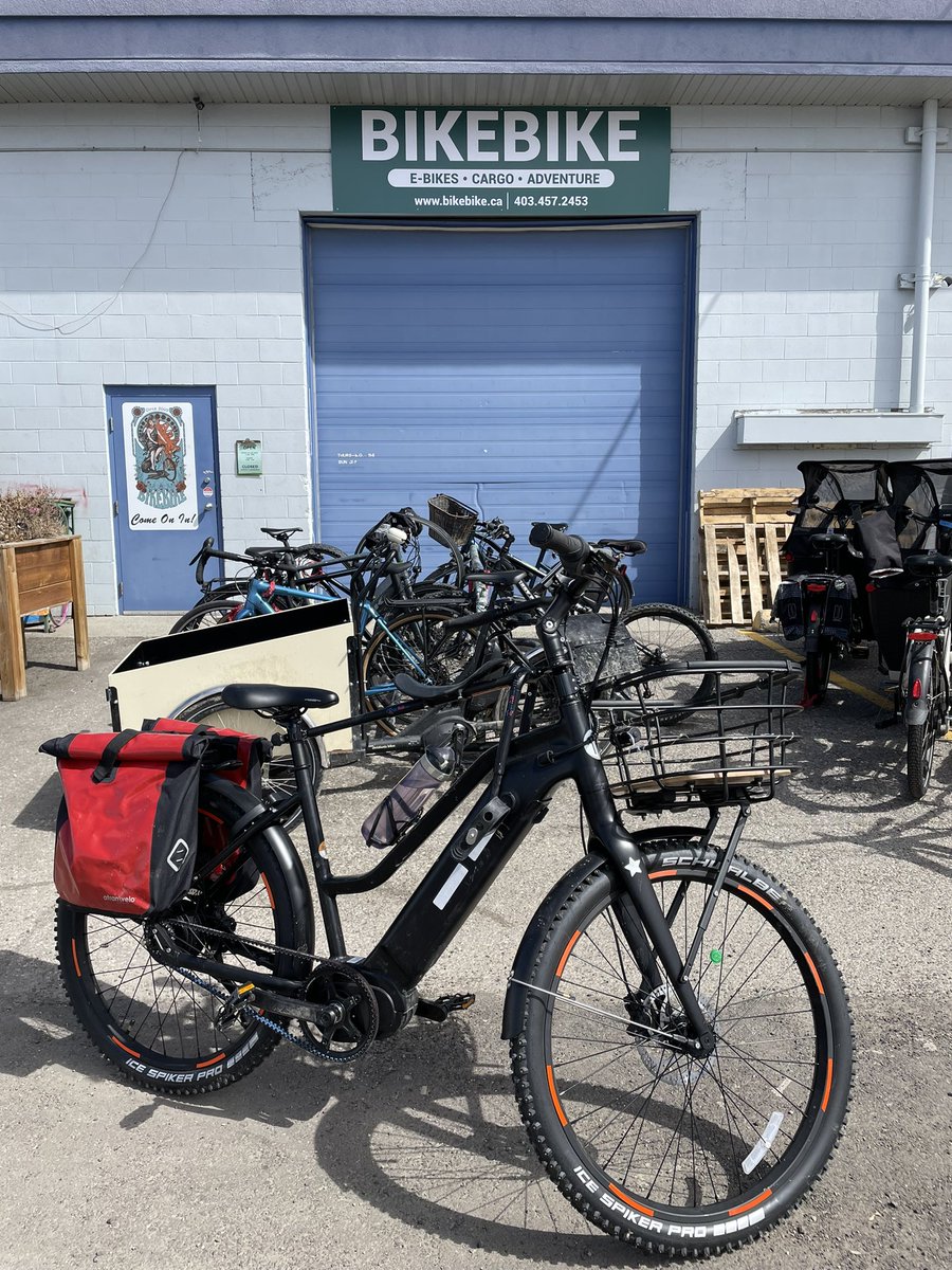 Sorted some things at @BikeBikeYYC today, had lovely chats, enjoyed a scrumptious cookie and coffee, and now our @macridemore seat is attached to our TuffHill bike @Sean_Tuff. Our 2yo is now 3 and LOVES a seat up front! #yycbike