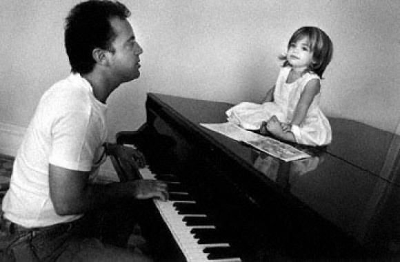 Billy Joel playing piano and singing for his daughter, 1988