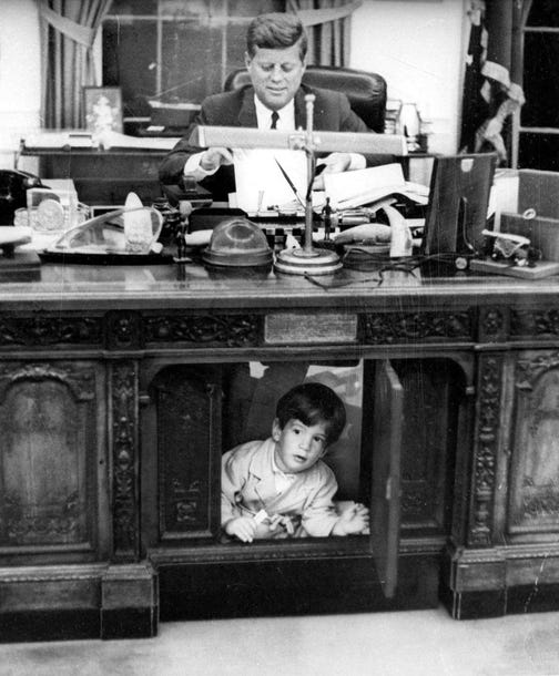 President Kennedy & John Kennedy Jr. in the Oval Office at the White House, 1963.