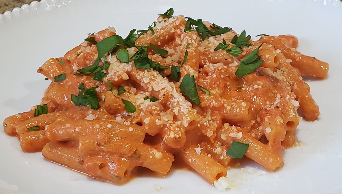 Made sedanini red lentil pasta in a creamy red sauce with garlic and parmesan.  The pasta was pretty good, but slightly different tasting than regular pasta. #BonAppetit