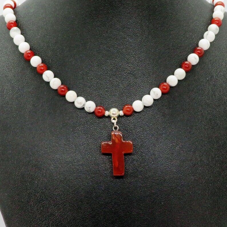 'Carnelian Gemstone Cross with White Howlite & Carnelian Adjustable Beaded Necklace - perfect for Christian and Religious individuals seeking a meaningful accessory. #GemstoneJewelry #ReligiousJewelry' buff.ly/3T8QgFR