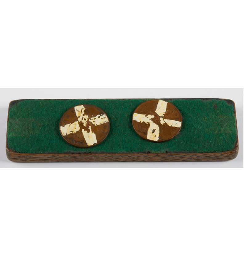 An Anzac tradition with an illegal past.

Anzac Day remains one of the only days that two-up can be legally played. The game was popularised by soldiers during WWI. This two-up set was seized by police in the 1970s.
Visit us to learn more about policing during world conflicts.