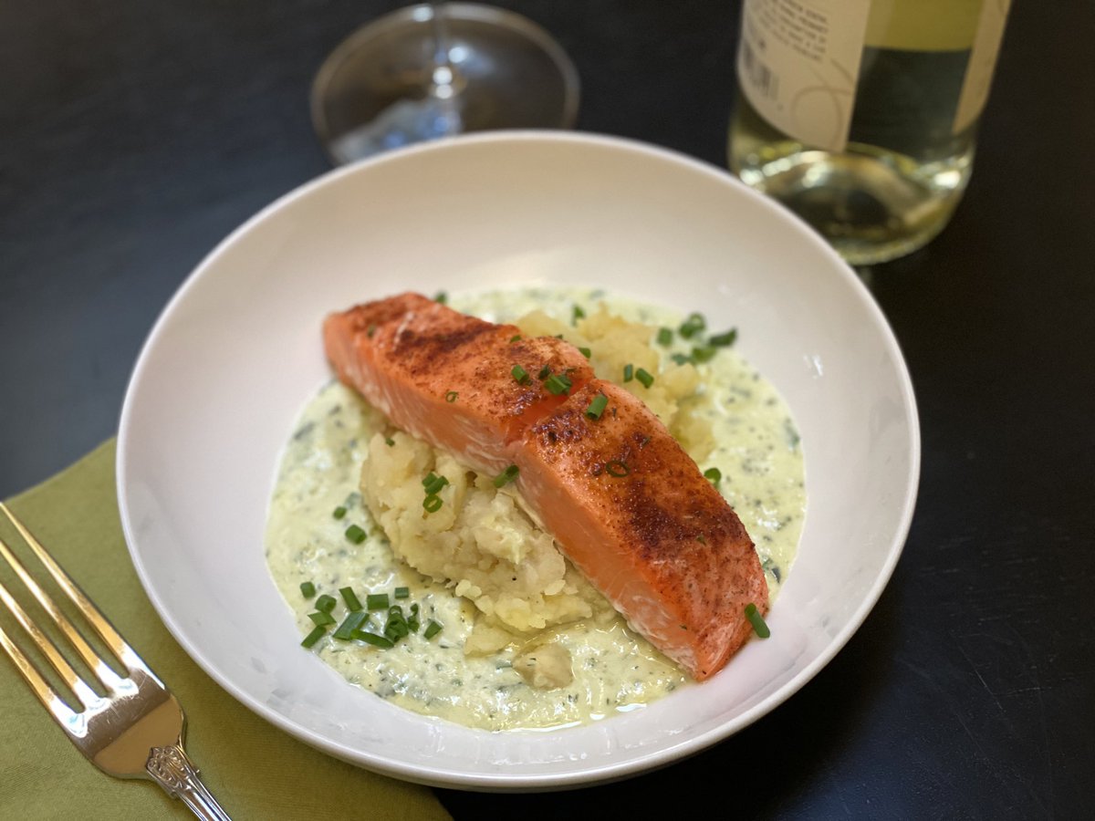 Tonight’s dinner: salmon atop potato and celery root mash with a leek and chive sauce accompanied by @DamselCellars vino. #herefishyfishy