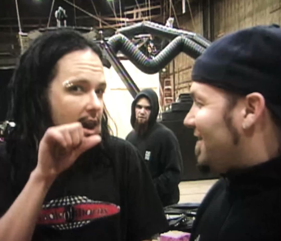 HEARTWARMING: Jonathan Davis of Korn has shared a photo of himself making suggestive gestures towards Fred Durst, singer of Limp Bizkit 

“he was just so sexy I couldn’t contain my sexual proclivities” he says. “the fact he’s only 5’2 but such an asshole makes me go Alpha mode”