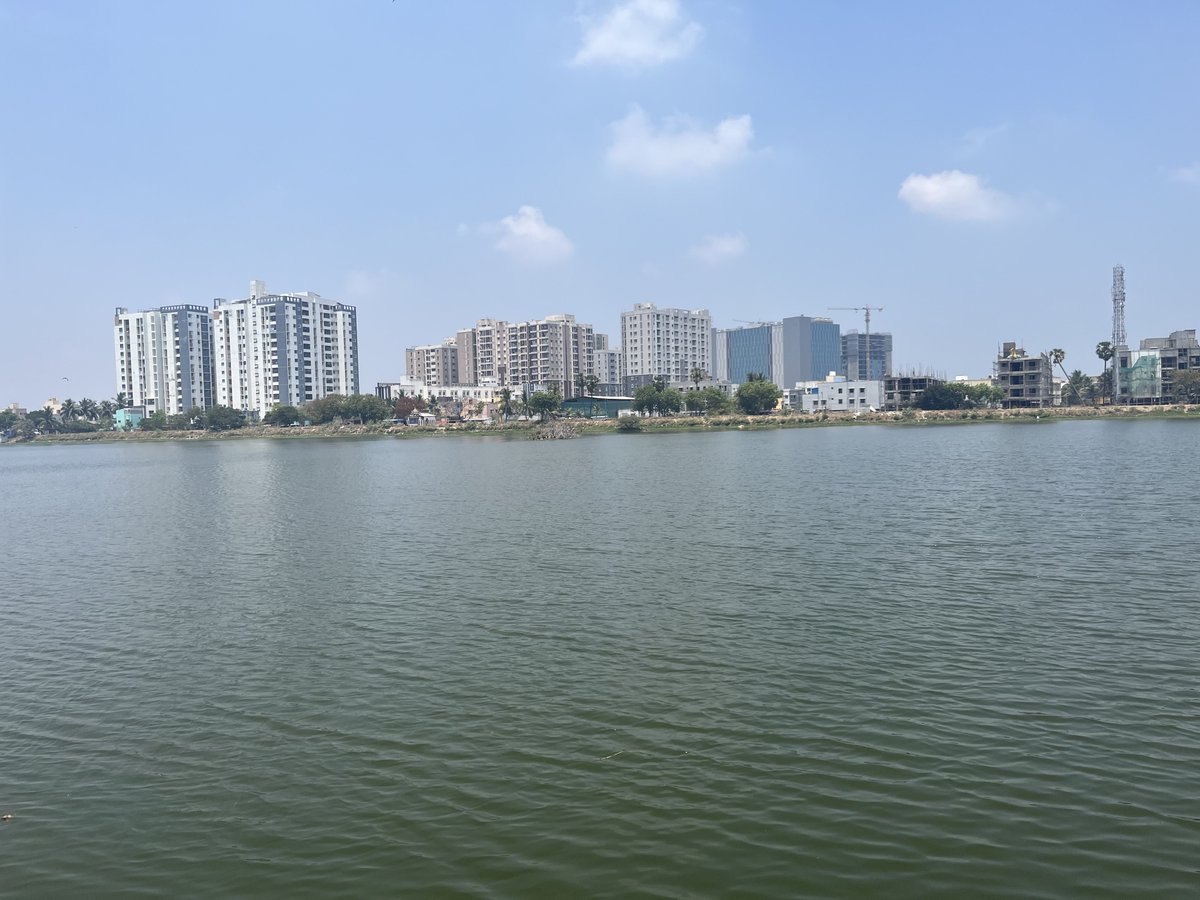 View from Narayanapuram Lake in Pallikaranai. So much of development coming along Radial Road… #Chennai  #Cityscape 🌇
