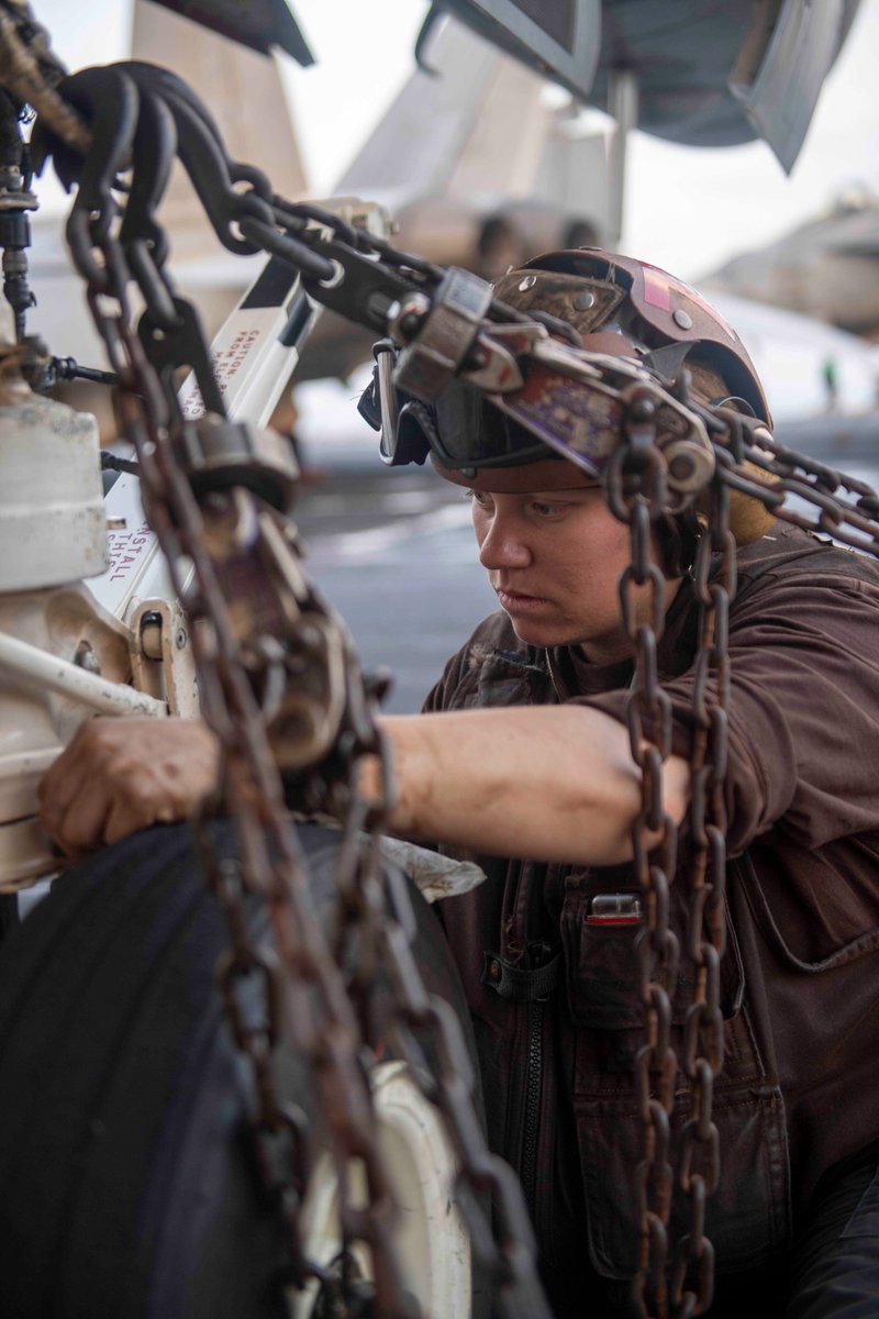 Up high or down low, these Sailors are #AlwaysReady to go!🤩They check all aircraft to make sure they're in tip-top shape, even in hard-to-reach places🔧#GreaterEachDay 📸: Sailors conduct maintenance on aircraft aboard USS Dwight D. Eisenhower (@TheCVN69) #WeLikeIke #TheNavyWay