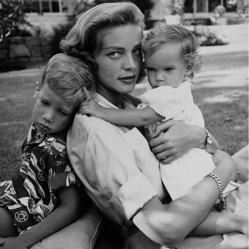 Lauren Bacall with her children Stephen Humphrey Bogart and Leslie Howard Bogart, 1953. Photo by Dennis Stock.