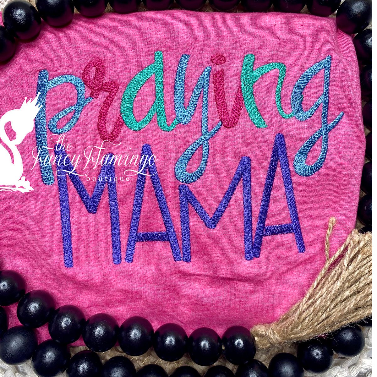 This colorful praying mama embroidered shirt is the perfect way to add a pop of color to your wardrobe while expressing your faith. #prayingmama #machineembroidery #mothersdaygift #giftforher #jacksonvillemoms