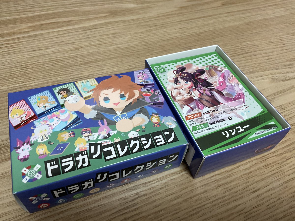 harugame86's tweet photo. ロピンさん企画のドラガリボードゲーム「ドラガ・リ・コレクション」にリンユーで参加させていただきました。

そしてついに手元に！
あああ、リンユーが実物のカードになるなんて！
本当に最高で涙が出る😭
皆さんの超美麗カードも大ボリュームで収録してるので
これは全ドラガリアンが持つべきです！ https://t.co/eLe471ZXpD