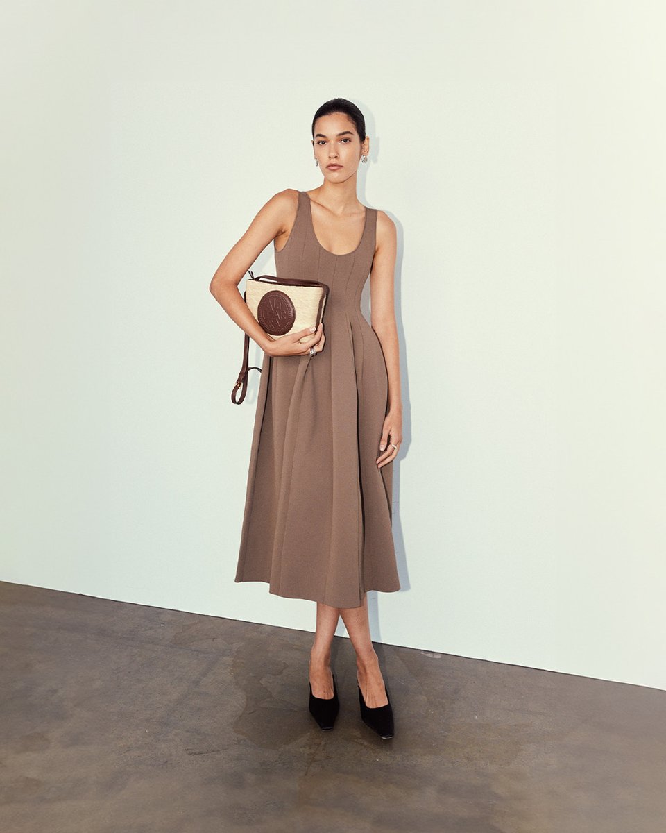 The 'Medallion' Watermill Camera Bag and Knit 'Spark' Dress from the SS24 Collection. 

altuzarra.com 
#AltuzarraSS24