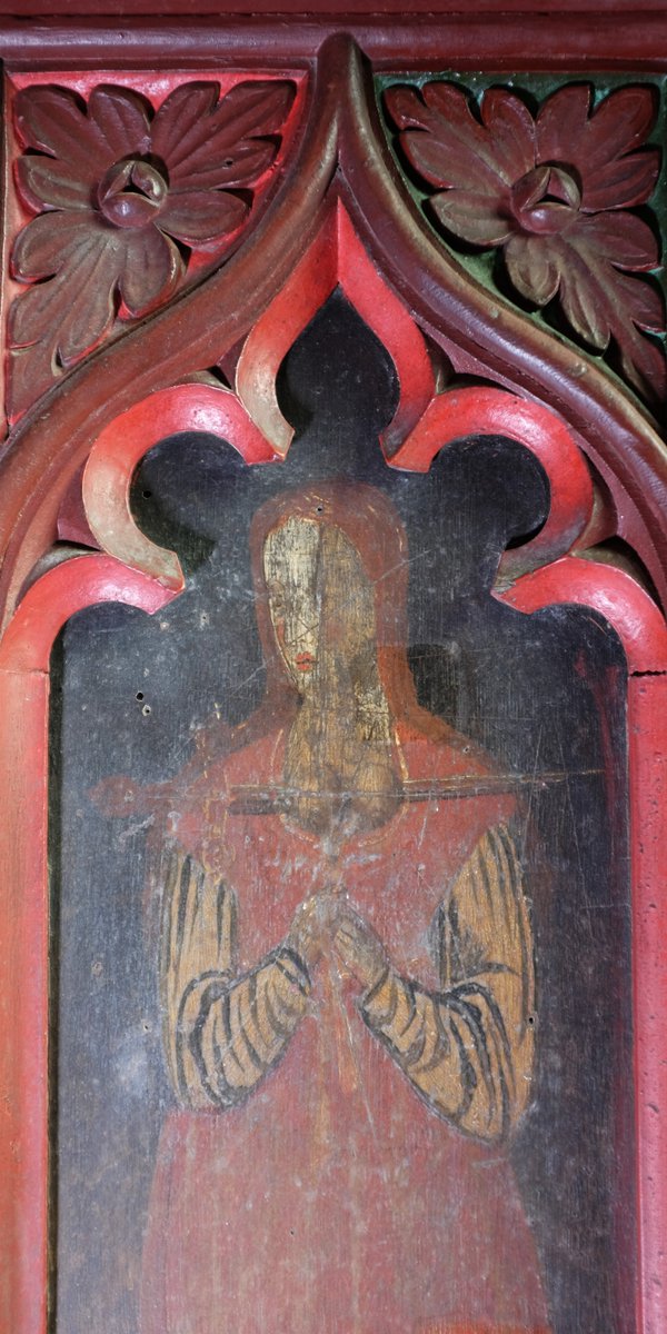 Ugborough #Devon Two images of female saints, both depicted pierced by swords. Church labels say it is St Lucy or St Agnes on the left with sword through throat and St Justina or St Agatha on the right with sword through breasts. Any clarification welcome. 📸: my own